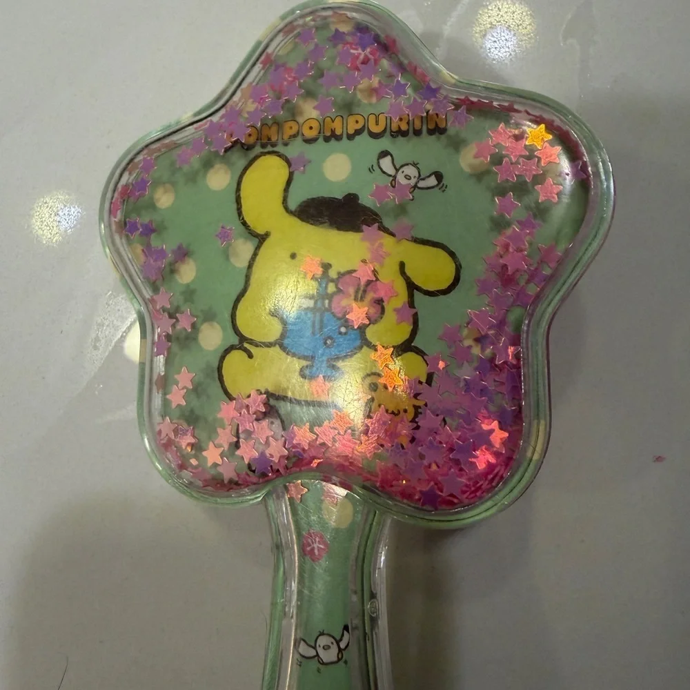 Sanrio Star-Shaped Hairbrush with Pompompurin and star glitter